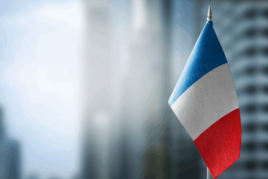 Drapeau de France sur fond urbain abstrait flou domiciliation entreprise